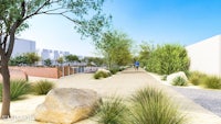 an artist's rendering of a courtyard with plants and rocks